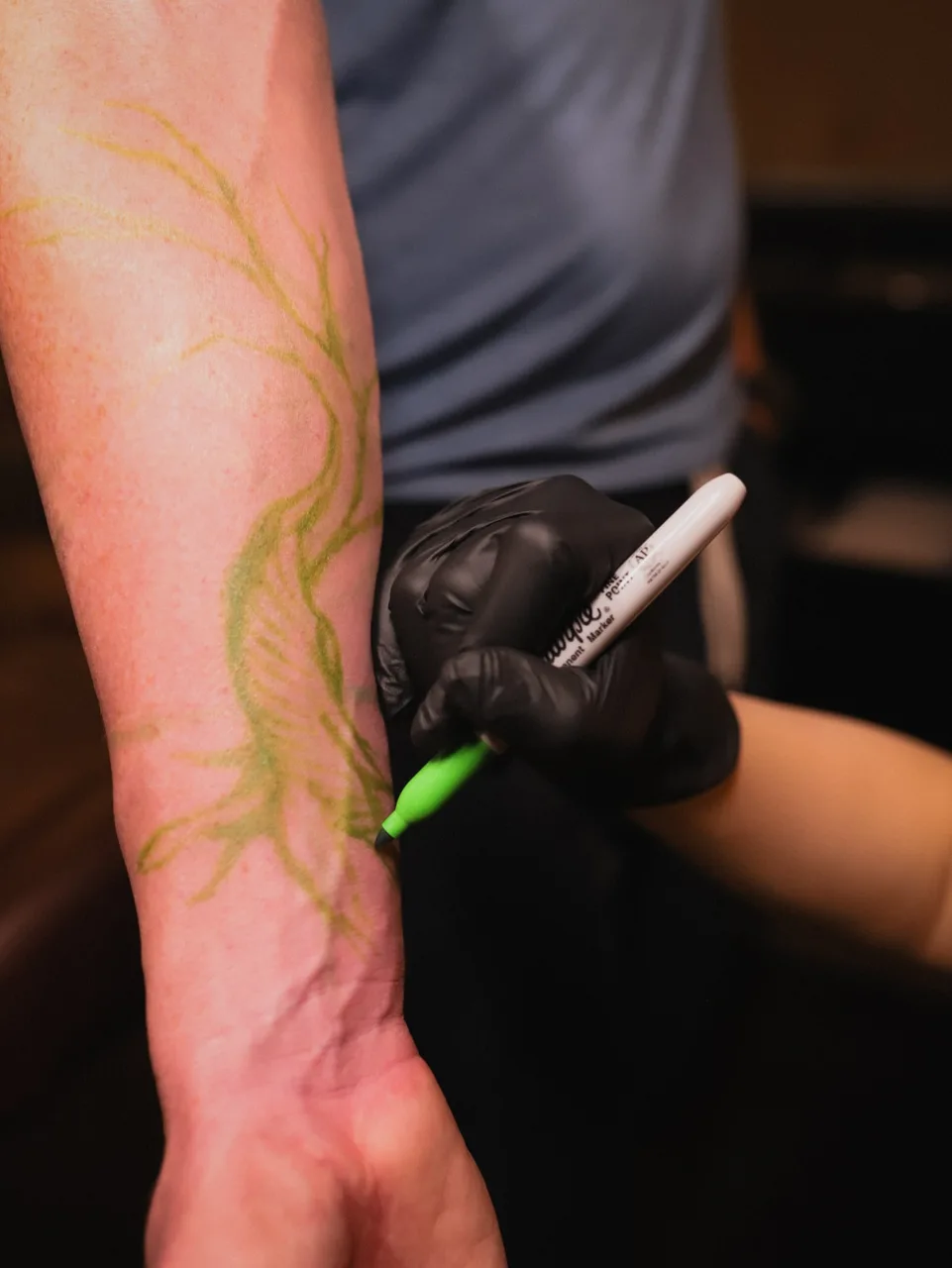 Bird fine line tattoo on the forearm by Tattoo Artist