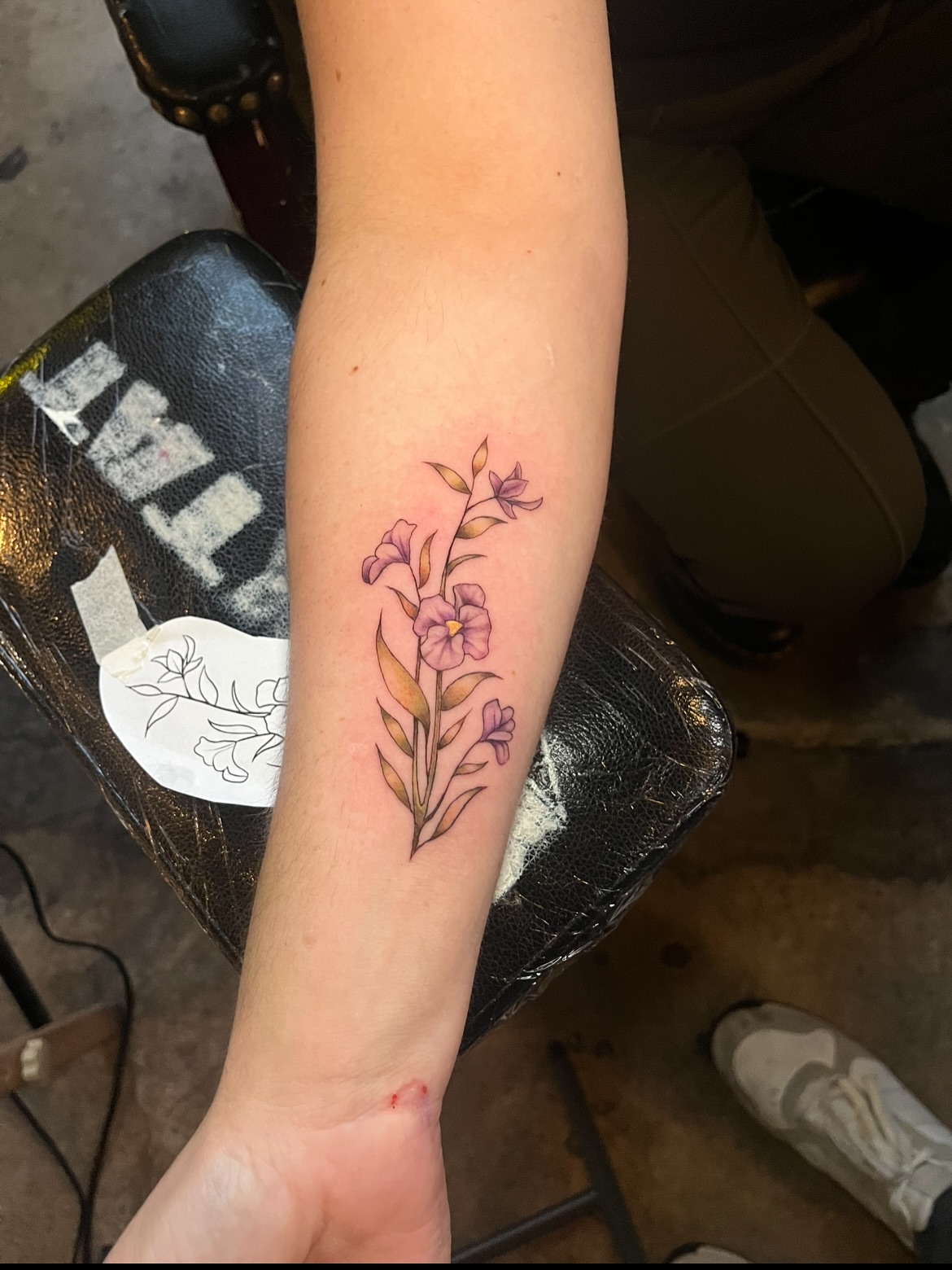 Flowers watercolor tattoo on the forearm by Jake, Salt Lake City, Utah