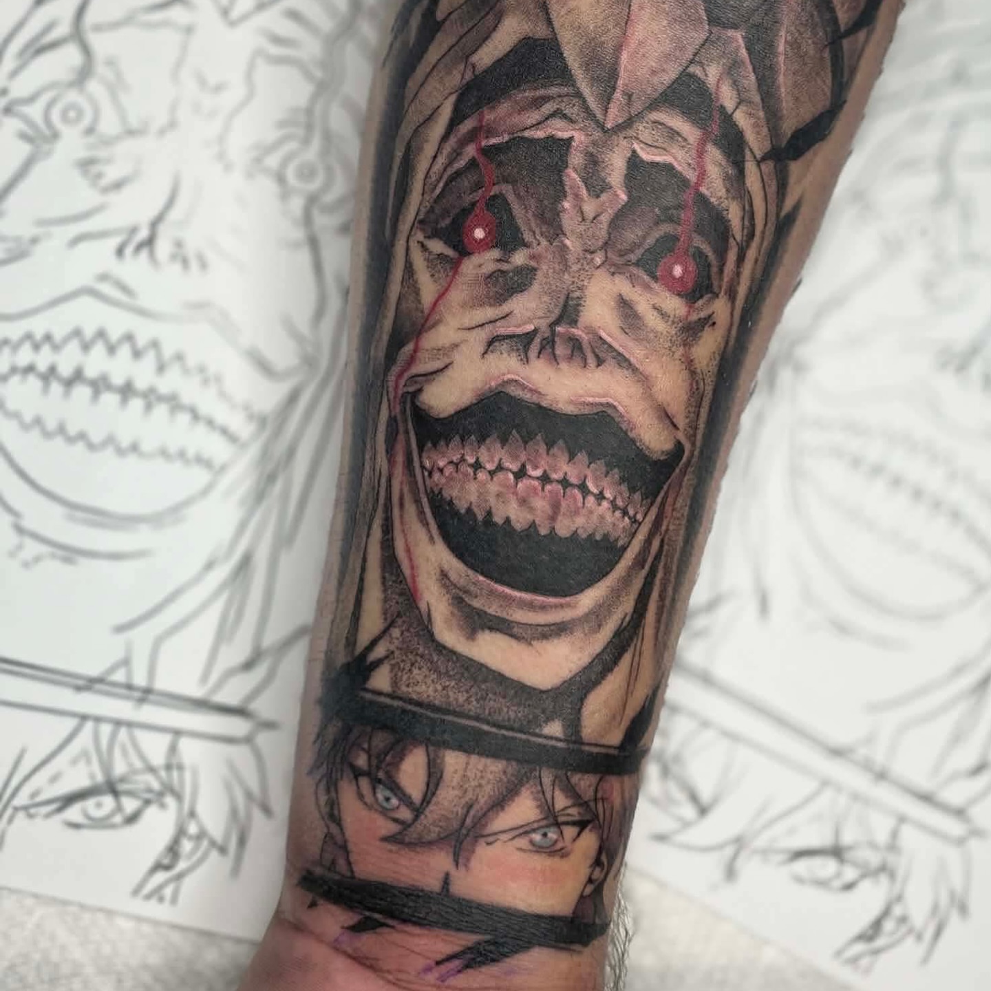 Joker dark realism tattoo on the forearm by Erin Moore