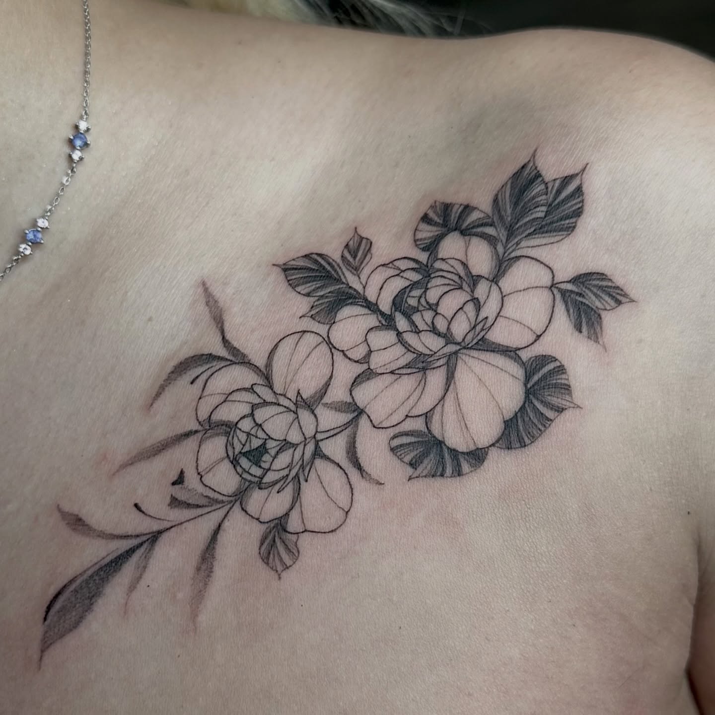 Floral bouquet black and grey tattoo on the shoulder by Crystal, Las Vegas, Nevada