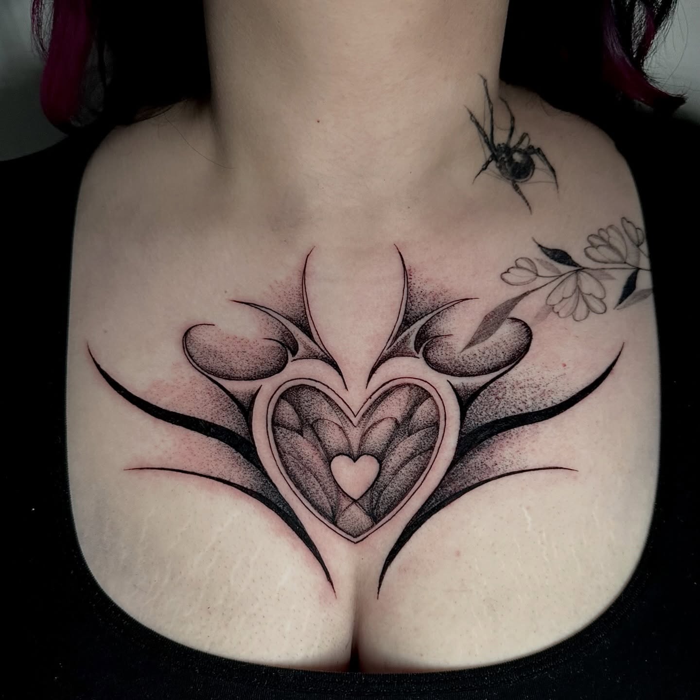 Heart dotwork tattoo on the chest by Crystal, Las Vegas, Nevada