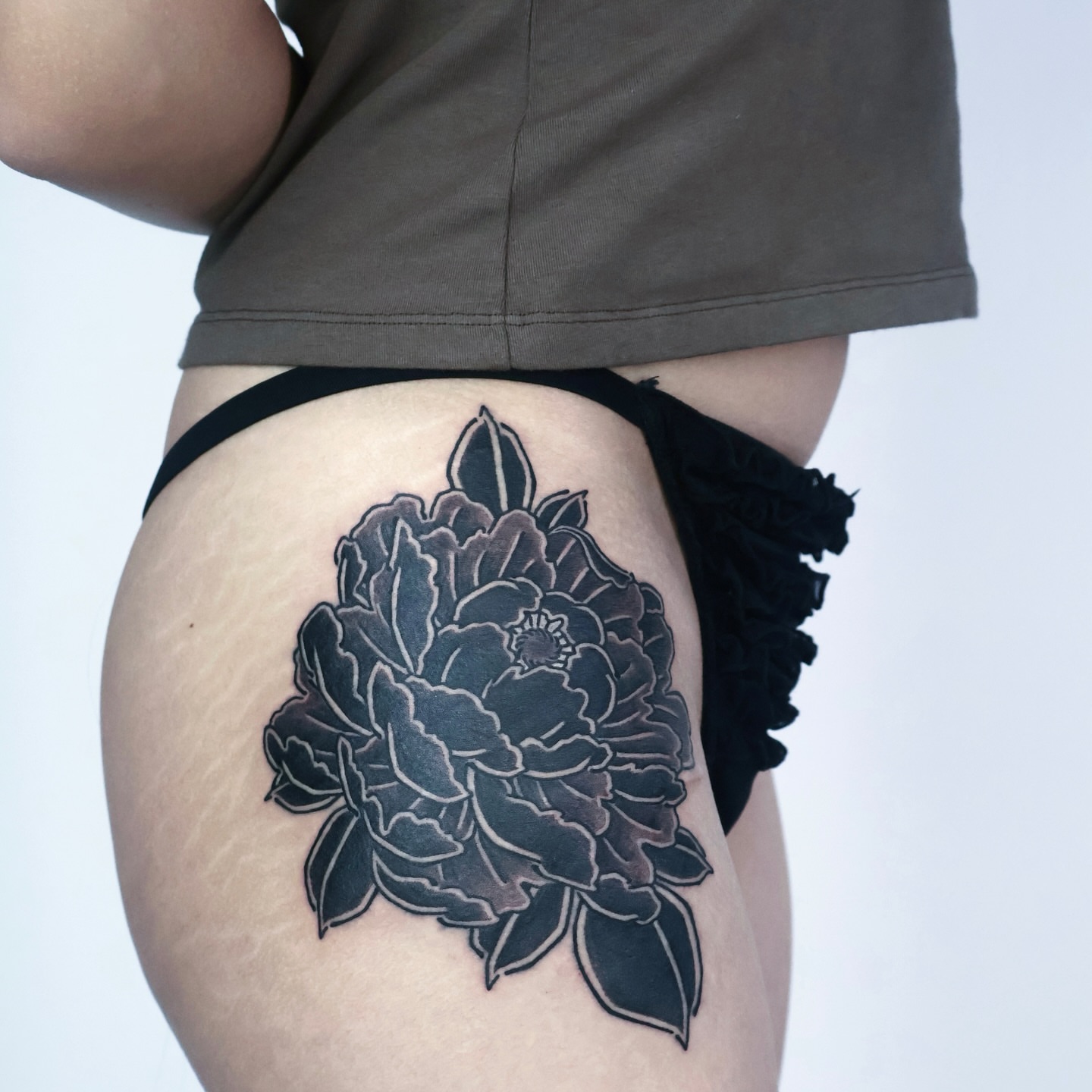 Peony black and grey tattoo on the thigh by JM kim, Melbourne, Victoria