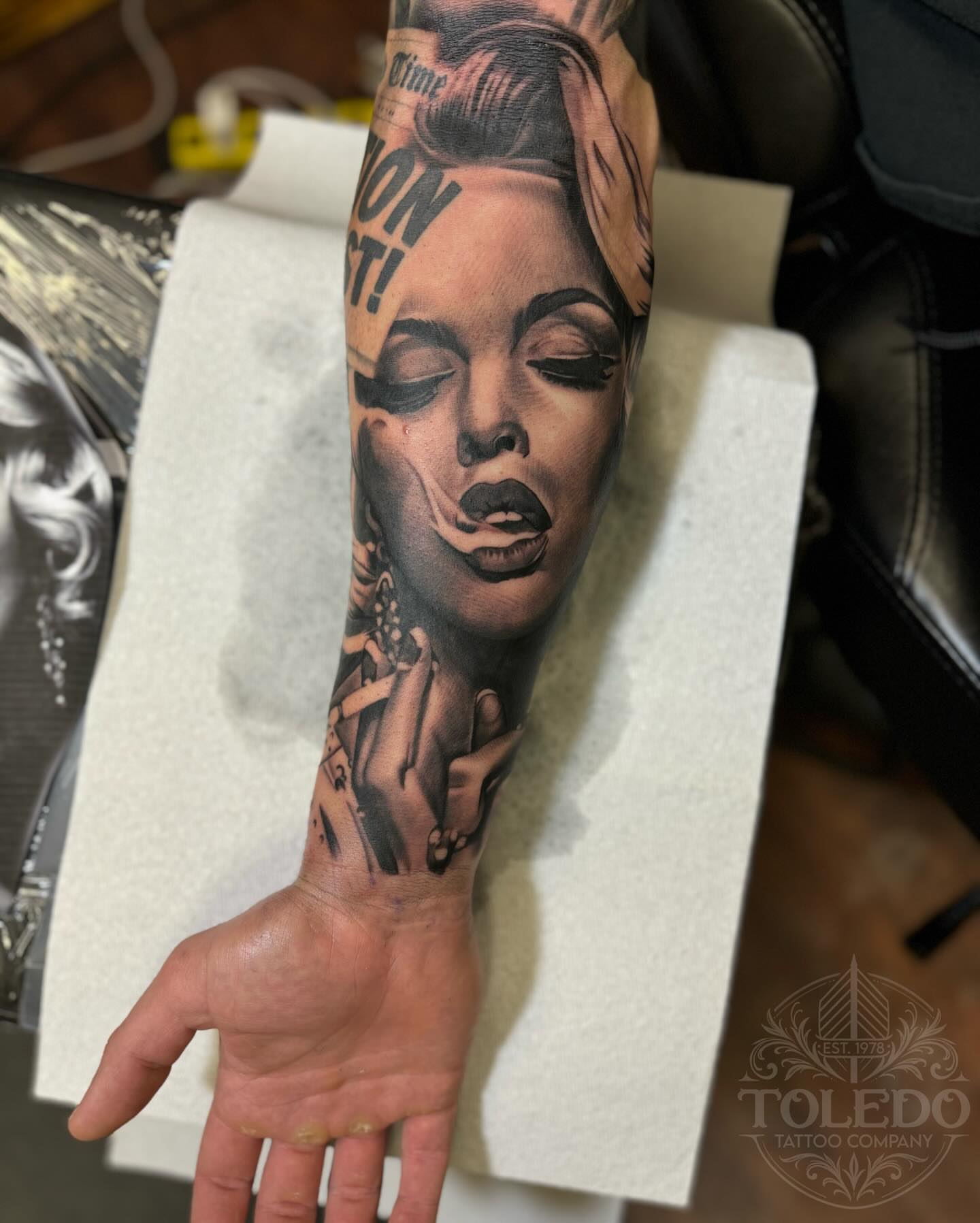 Woman's face realism tattoo on the forearm by Kodi Klo