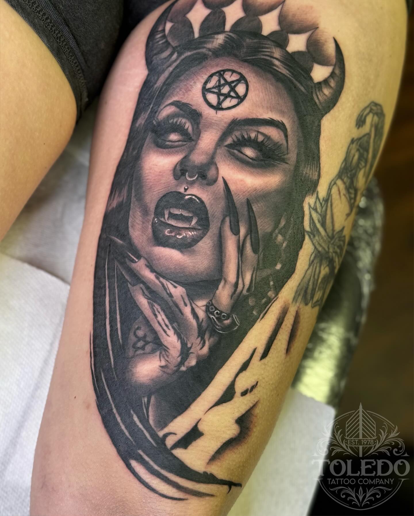 Woman with horns dark realism tattoo on the forearm by Kodi Klo