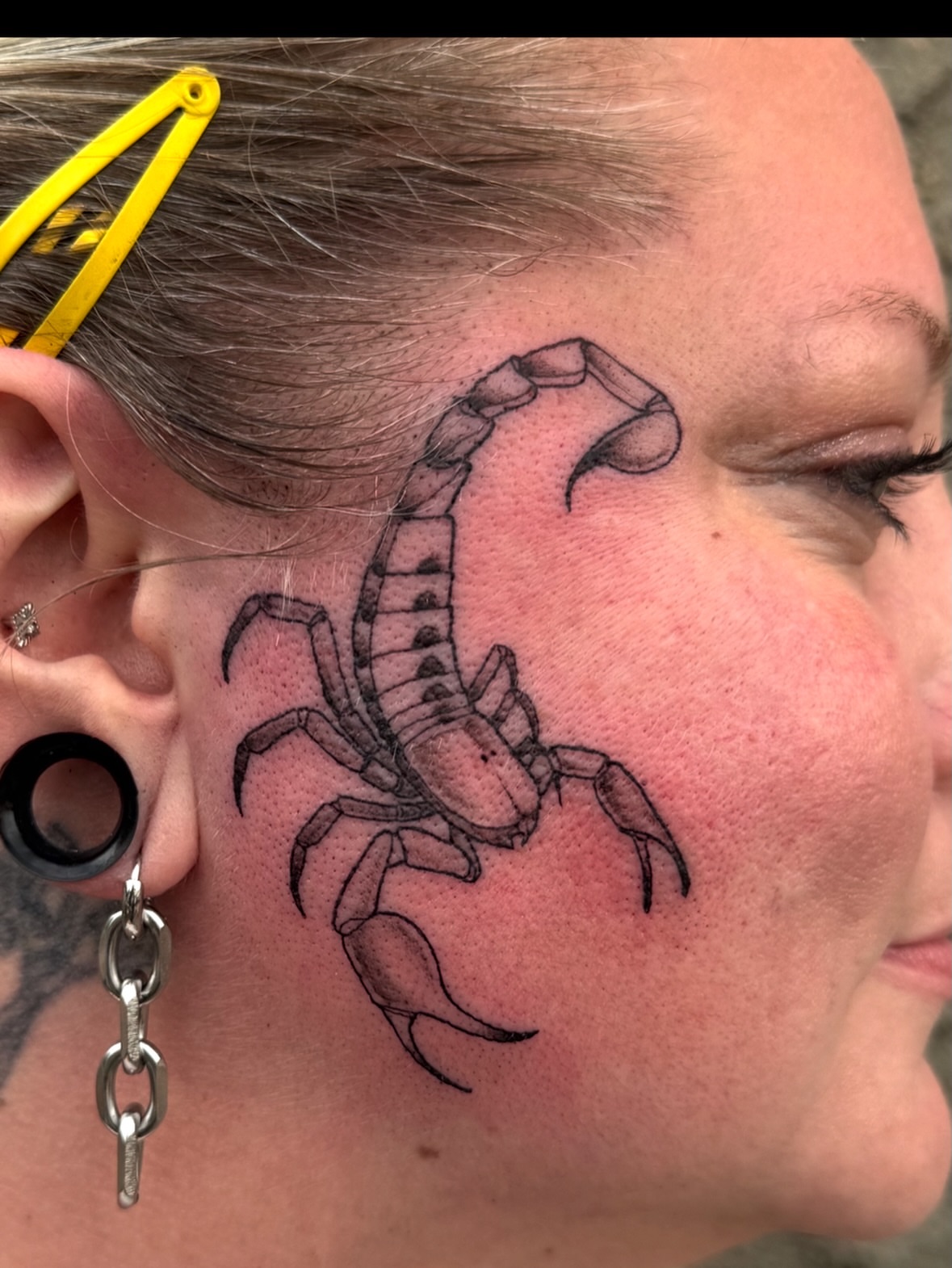 Scorpion black and grey tattoo on the head by Erin Bratzler
