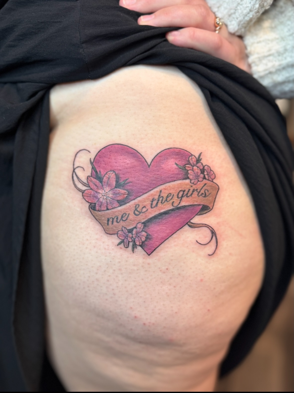 Heart with floral banner American traditional tattoo by Erin Bratzler