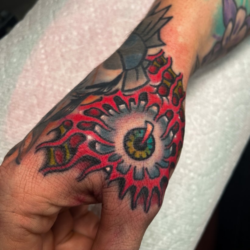 Eye American traditional tattoo on the hand by Sky G, Colorado Springs, Colorado