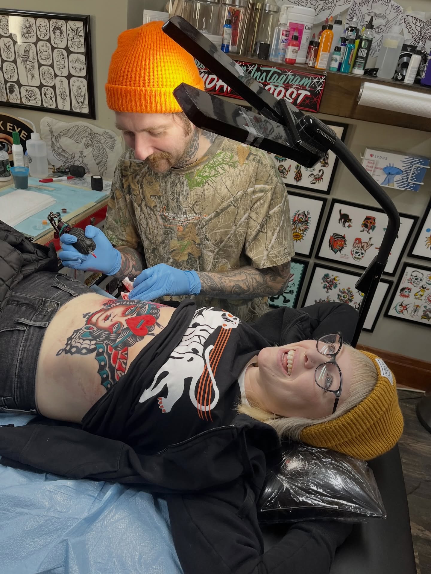 Woman with red lips American traditional tattoo on the torso by David Armacost, Cincinnati, Ohio