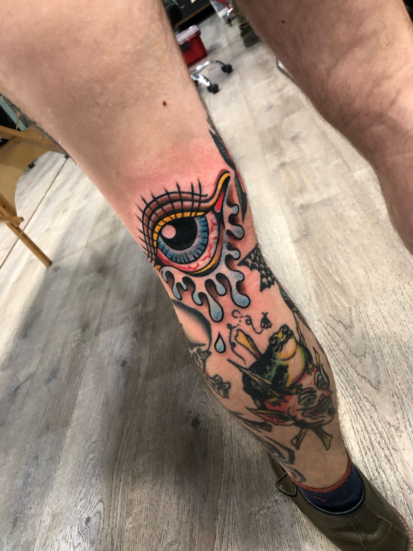 Owl and frog American traditional tattoo on the forearm by Nick Sharratt, Chicago, Illinois