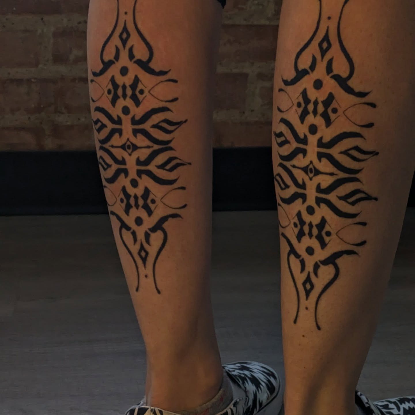 Tribal pattern tribal tattoo on the calf by Jasmine Dillon