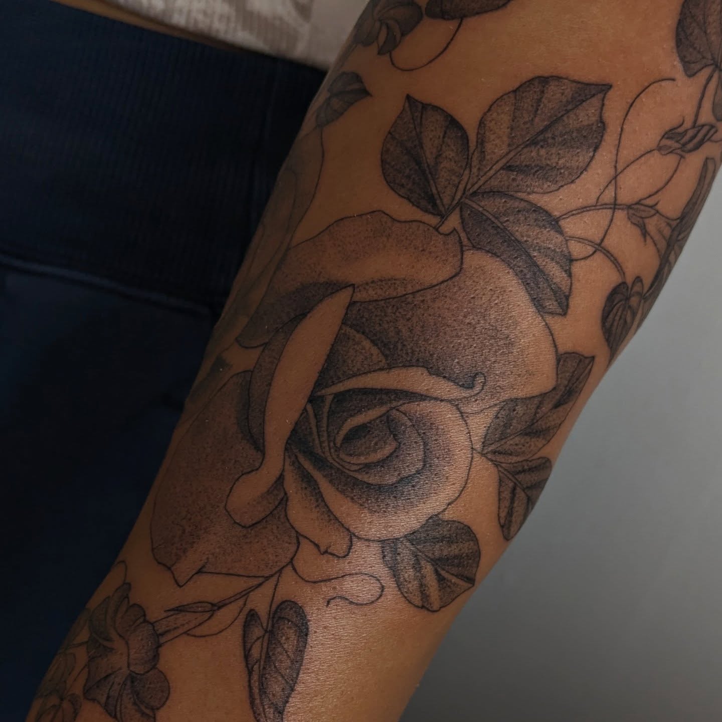 Roses dotwork tattoo on the forearm by Jasmine Dillon
