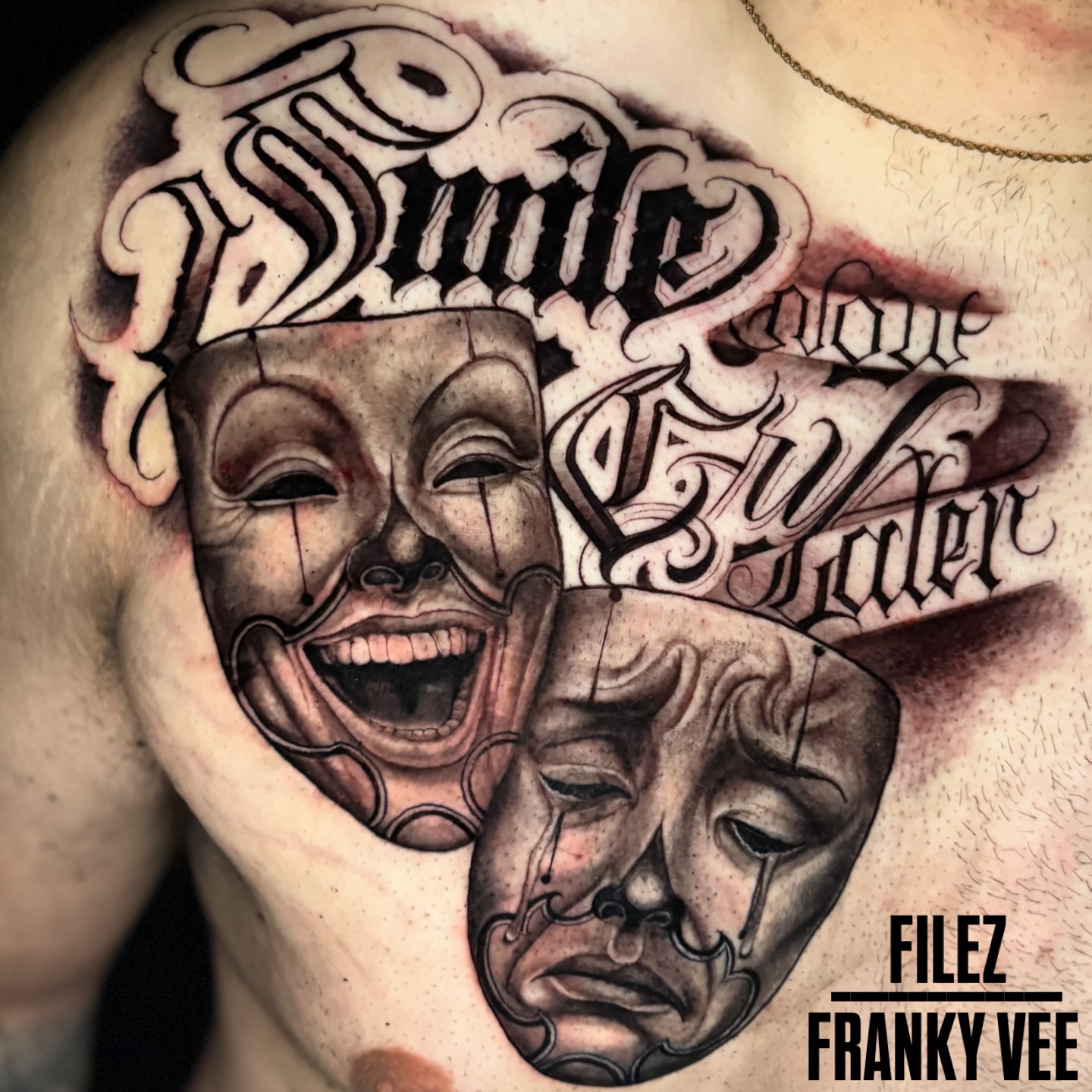 Theater masks realism tattoo on the chest by @_frankyvee