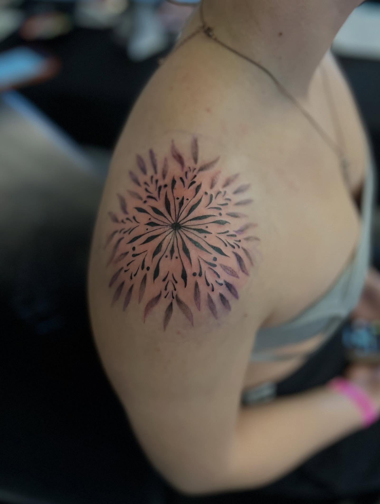 Mandala geometric tattoo on the shoulder by Rebecca Kern Tattoos
