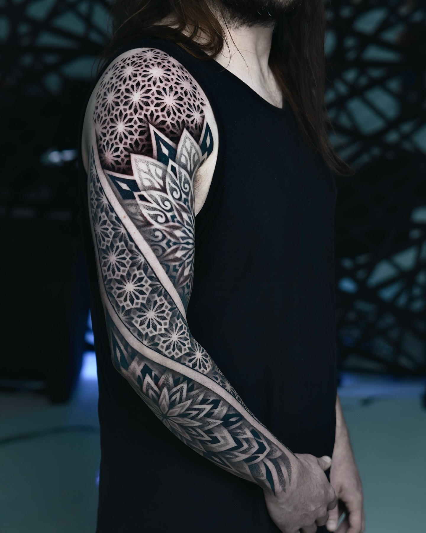Geometric patterns geometric tattoo on the upper arm by Ilya Cascad Kandaurov