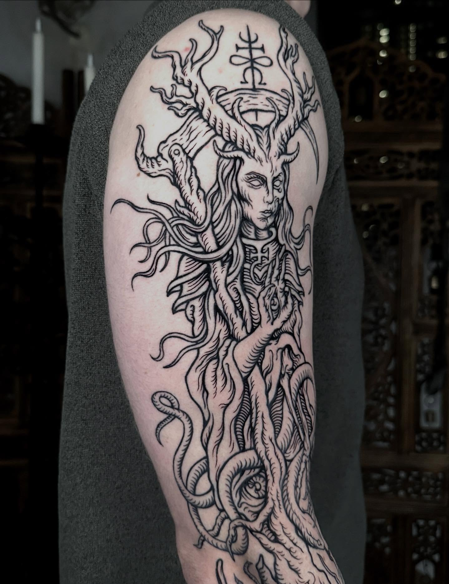 Mythical creature dark realism tattoo on the forearm by 𝕾𝖆𝖘𝖍𝖆 𝖂𝖔𝖑𝖆𝖓𝖉