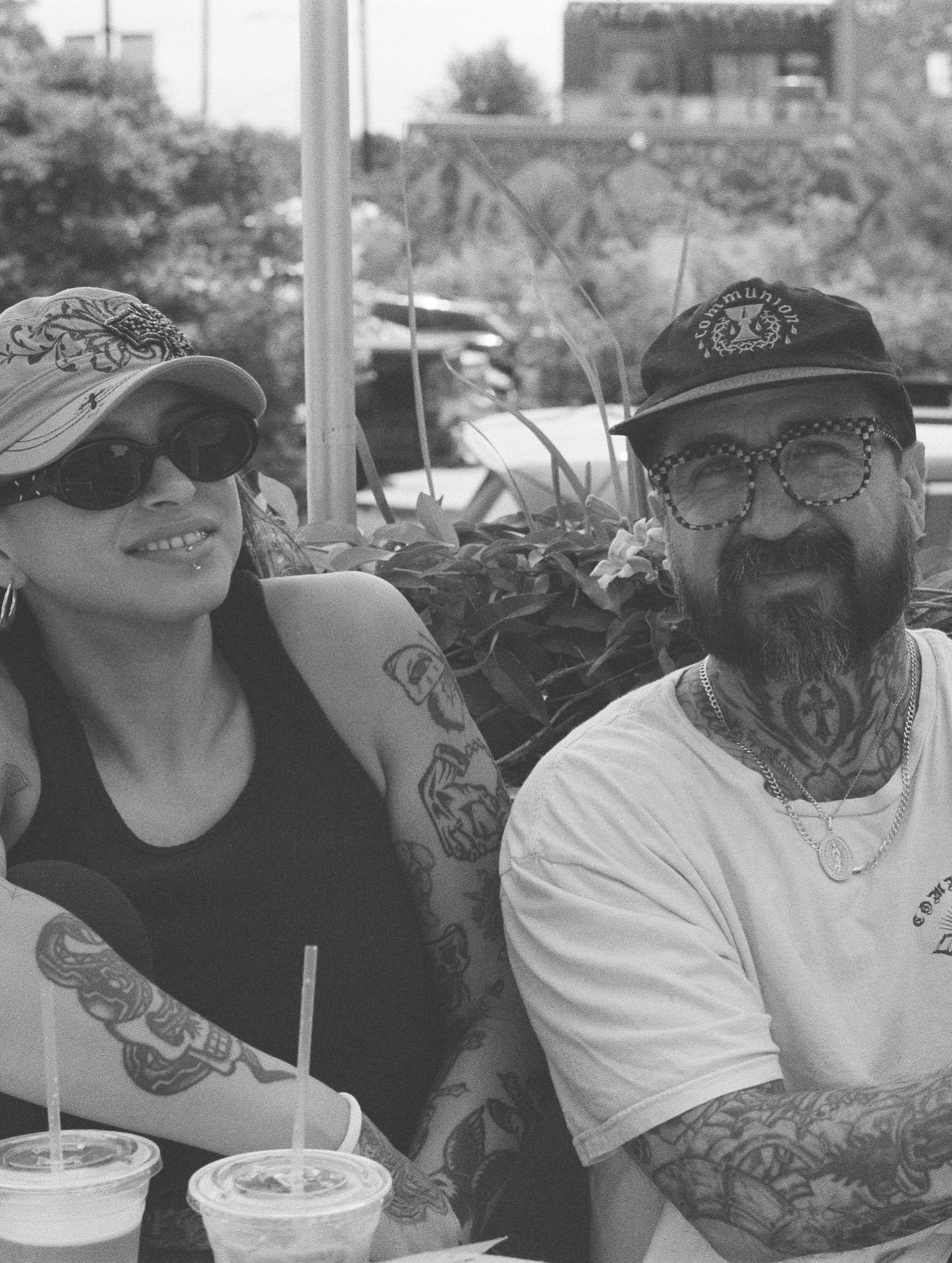 Tattooed couple black and grey tattoo by Sophia Tattoo