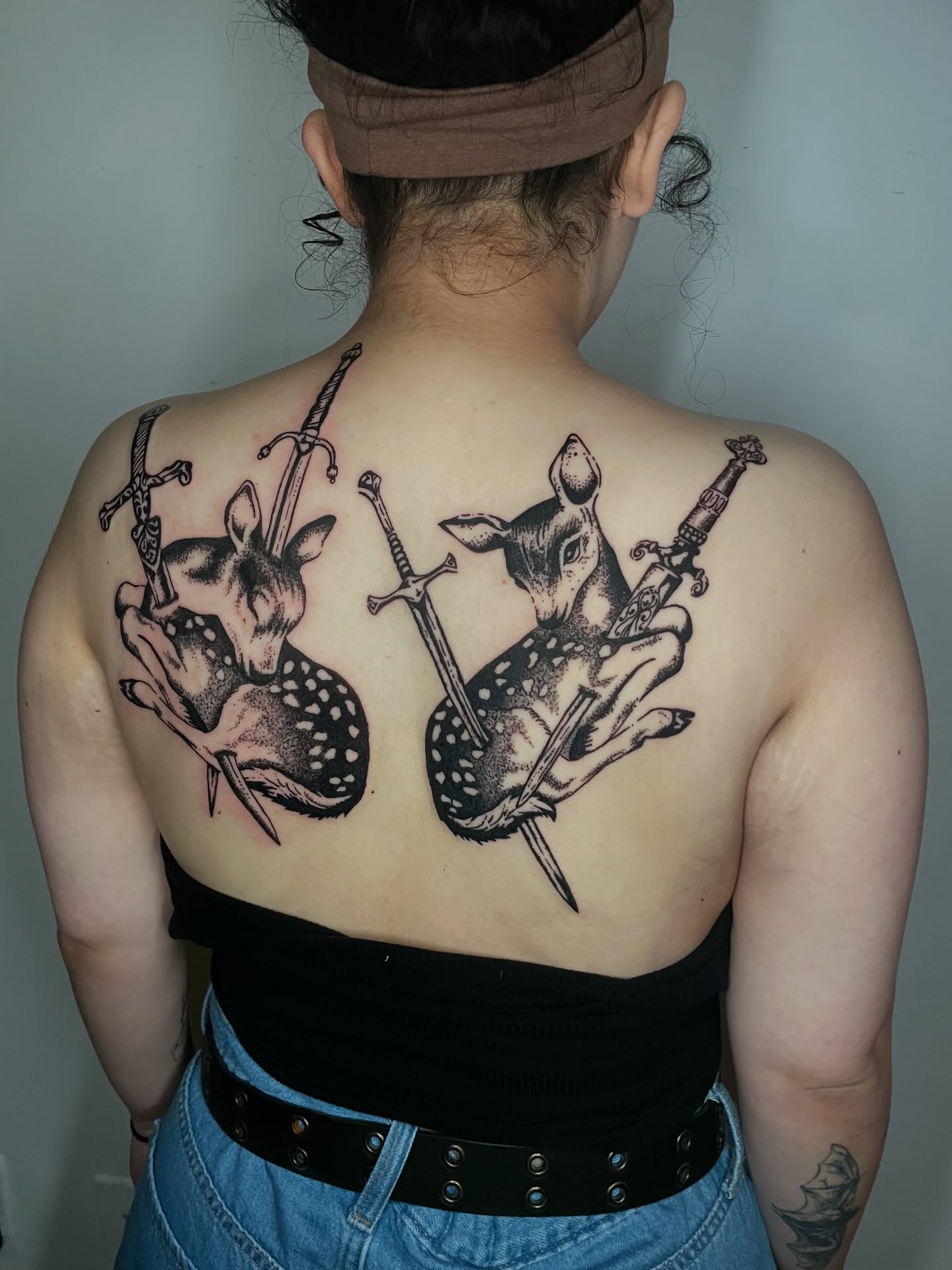 Deer and swords black and grey tattoo on the back by Sophia Tattoo