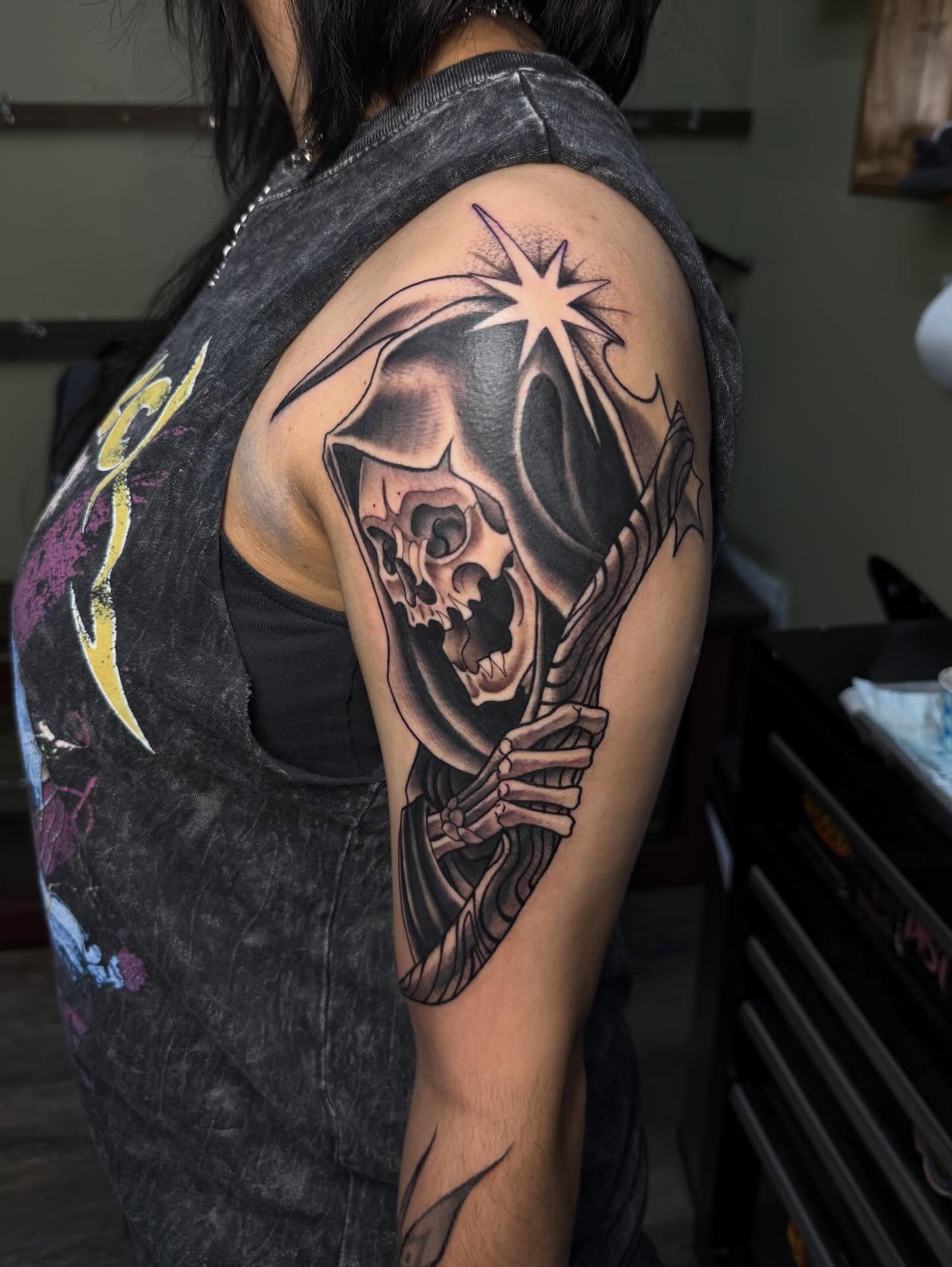Grim reaper realism tattoo on the shoulder by Eli