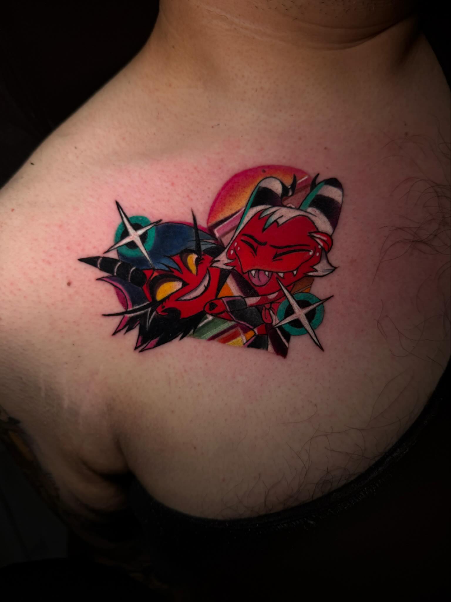 Two demons anime tattoo on the chest by Kenneth Ruiz