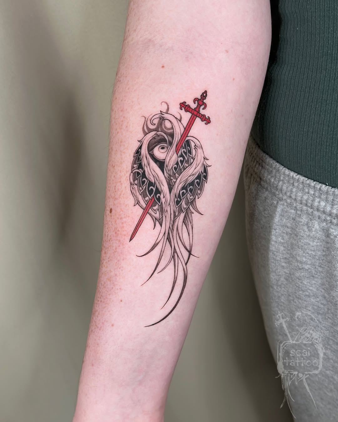 Sword through heart with wings cyber sigilism tattoo on the forearm by scaitattoo