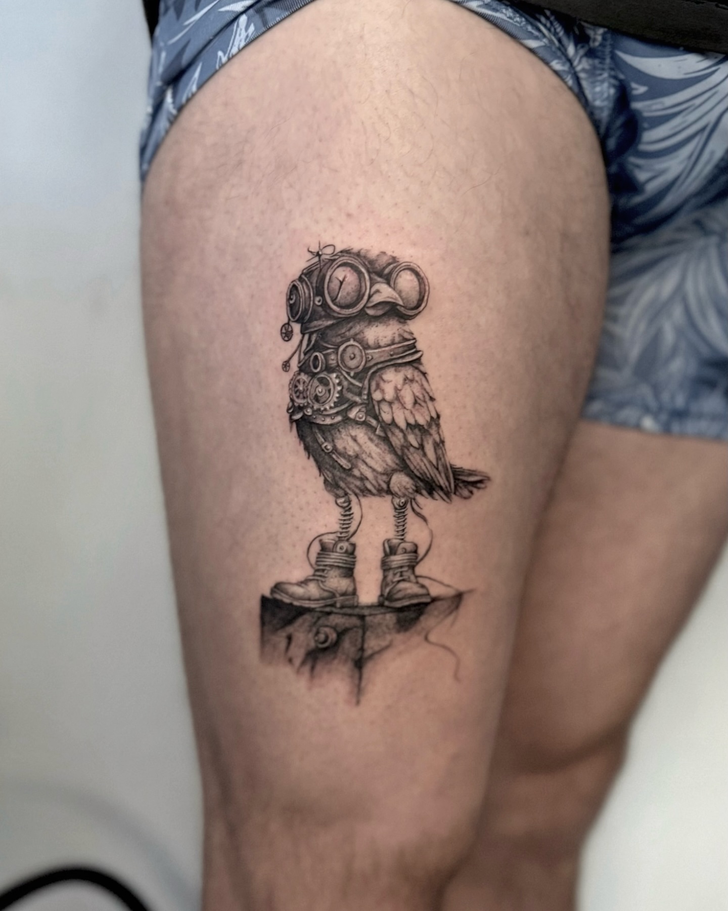 Steampunk bird realism tattoo on the thigh by Miro Ink Tattoo