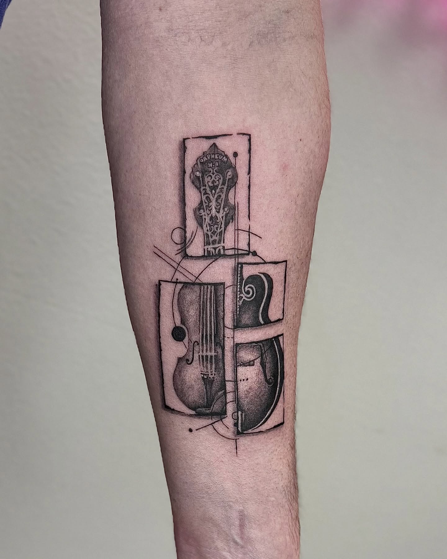 Violin black and grey tattoo on the forearm by Miro Ink Tattoo