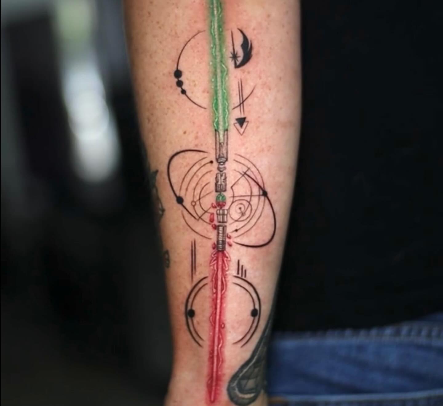Lightsaber geometric tattoo on the forearm by 𝐒𝐡𝐞𝐫𝐥𝐥𝐲