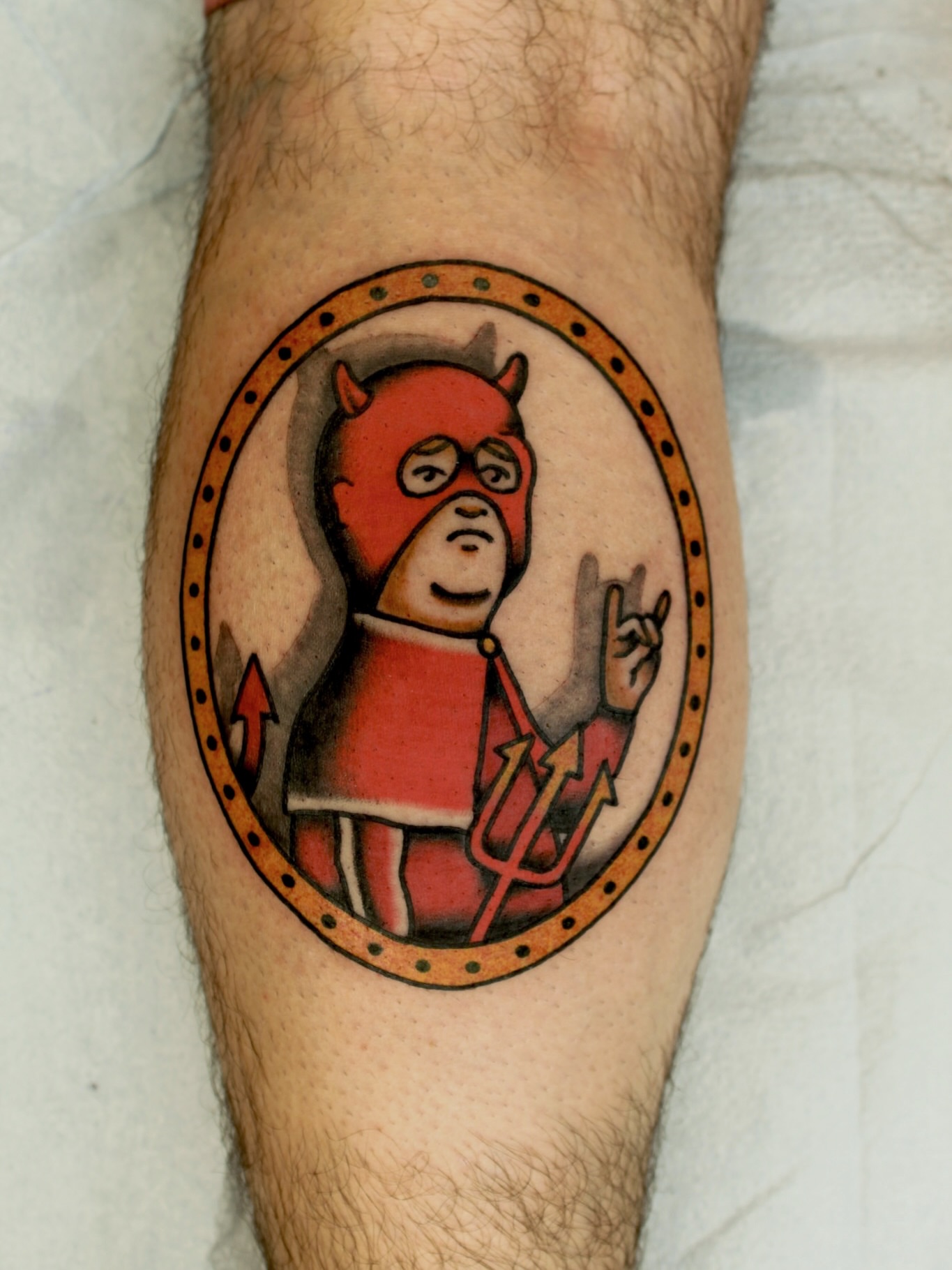 Devil character dotwork tattoo on the forearm by Kehrmie Tattoos, Berkeley, California