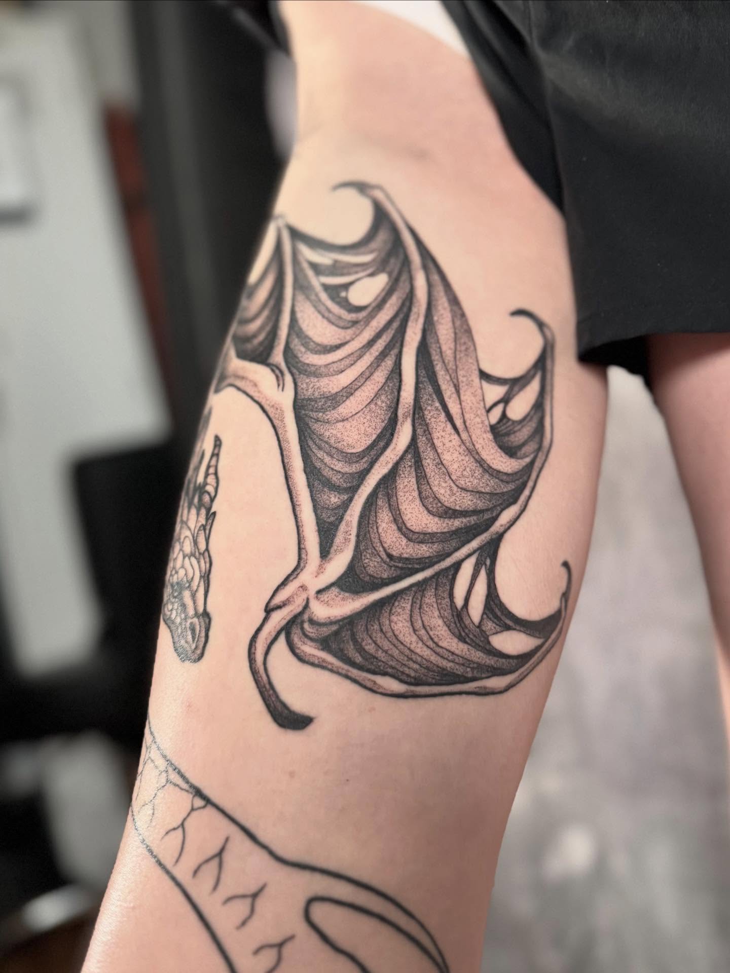 Dragon dotwork tattoo on the forearm by Hillary