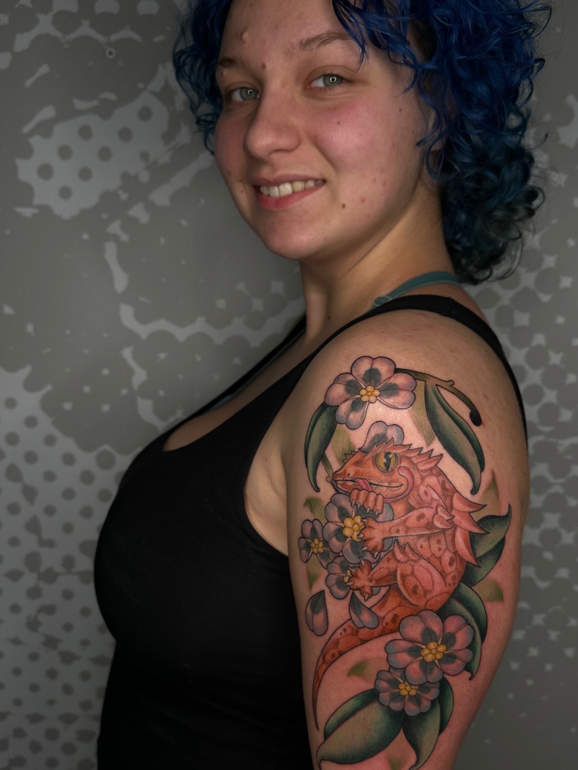 Gecko and flowers new school tattoo on the shoulder by Hannah Burnside, Charlotte, North Carolina
