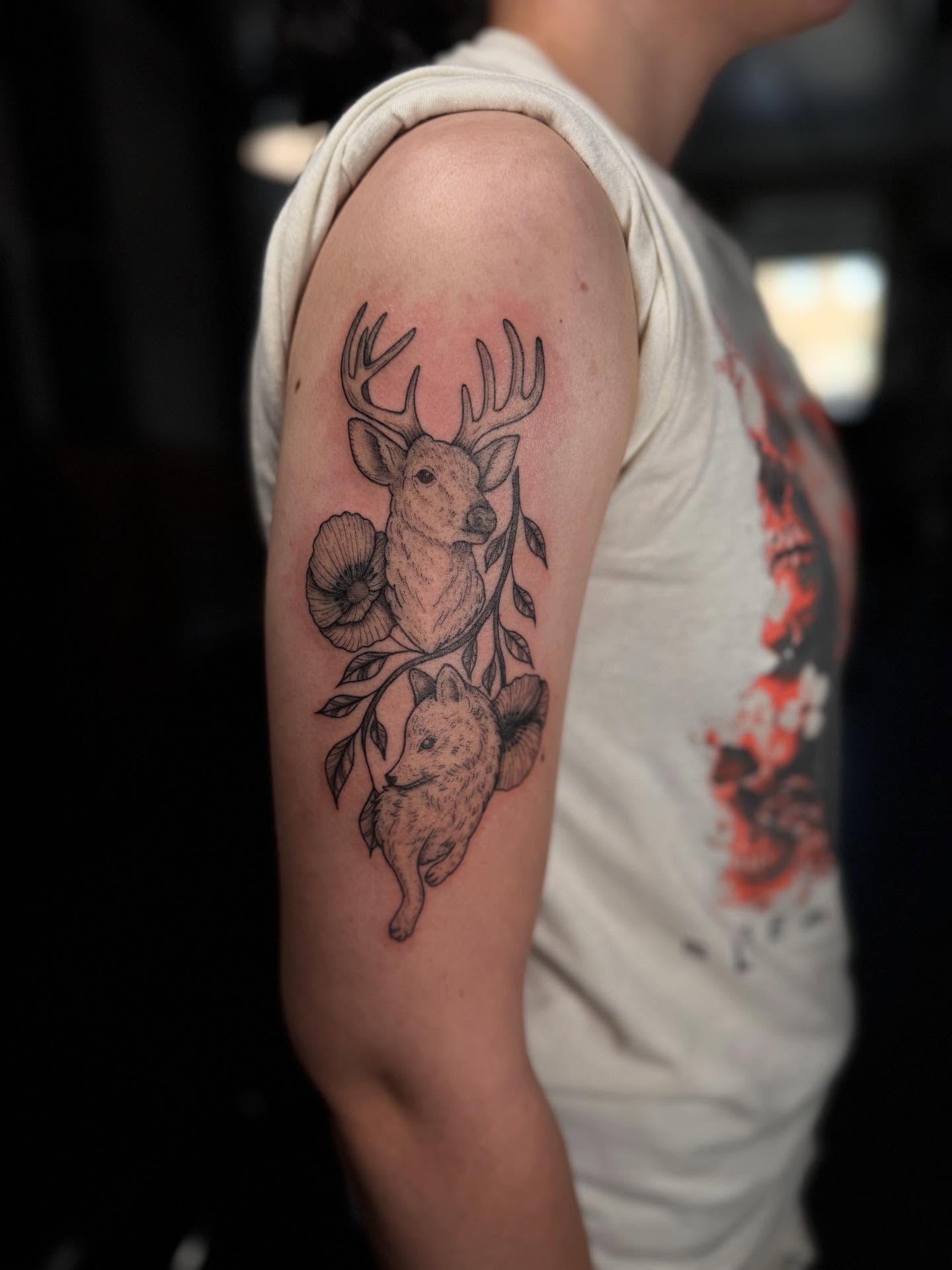 Deer and rabbit realism tattoo on the forearm by Koko