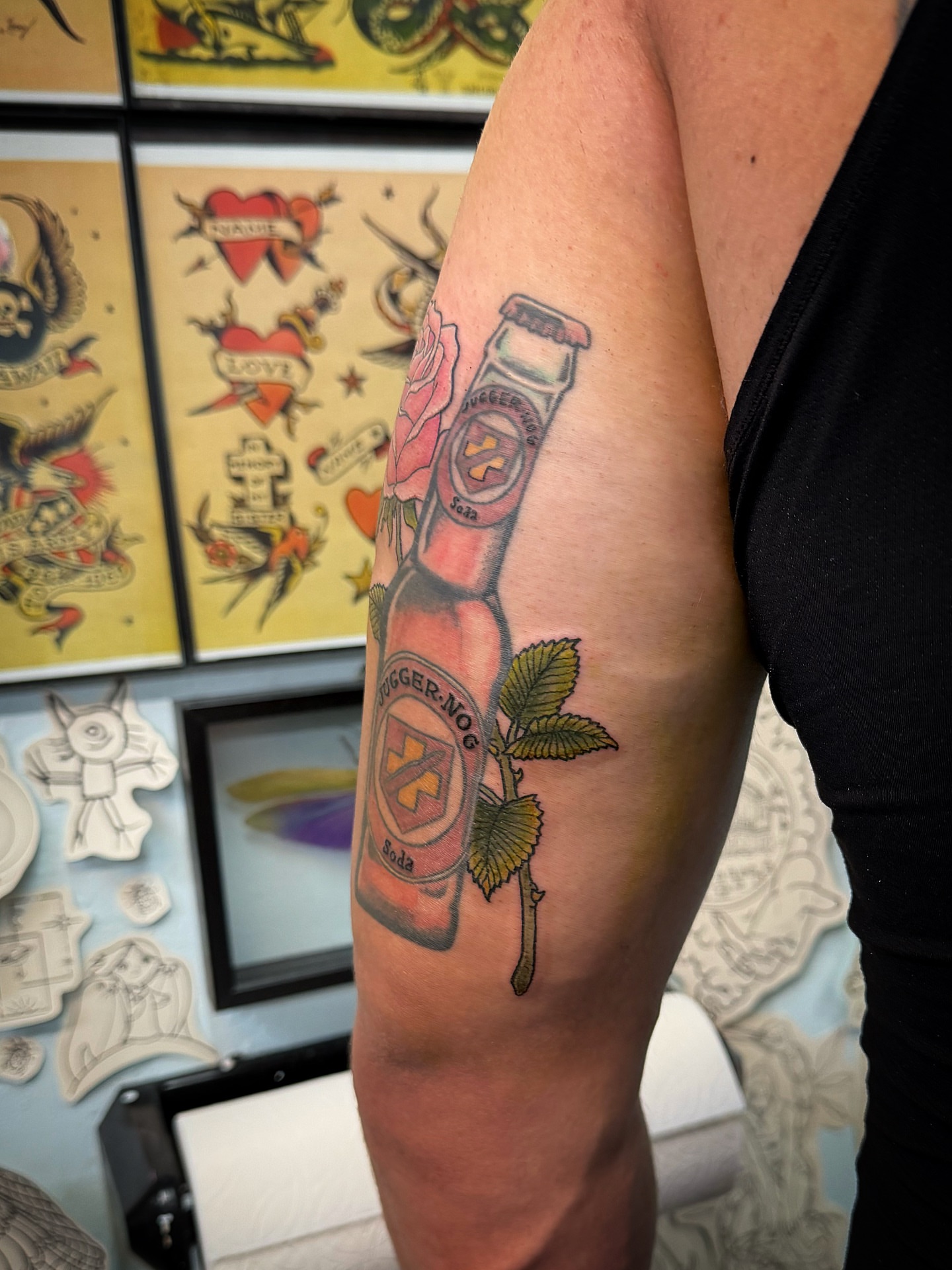 Digger-nog bottle American traditional tattoo on the forearm by Laura