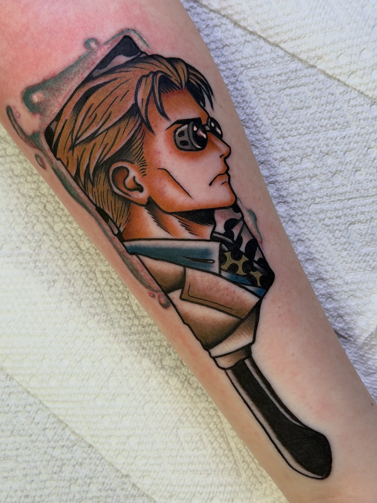 Anime character anime tattoo on the forearm by Cory Craft