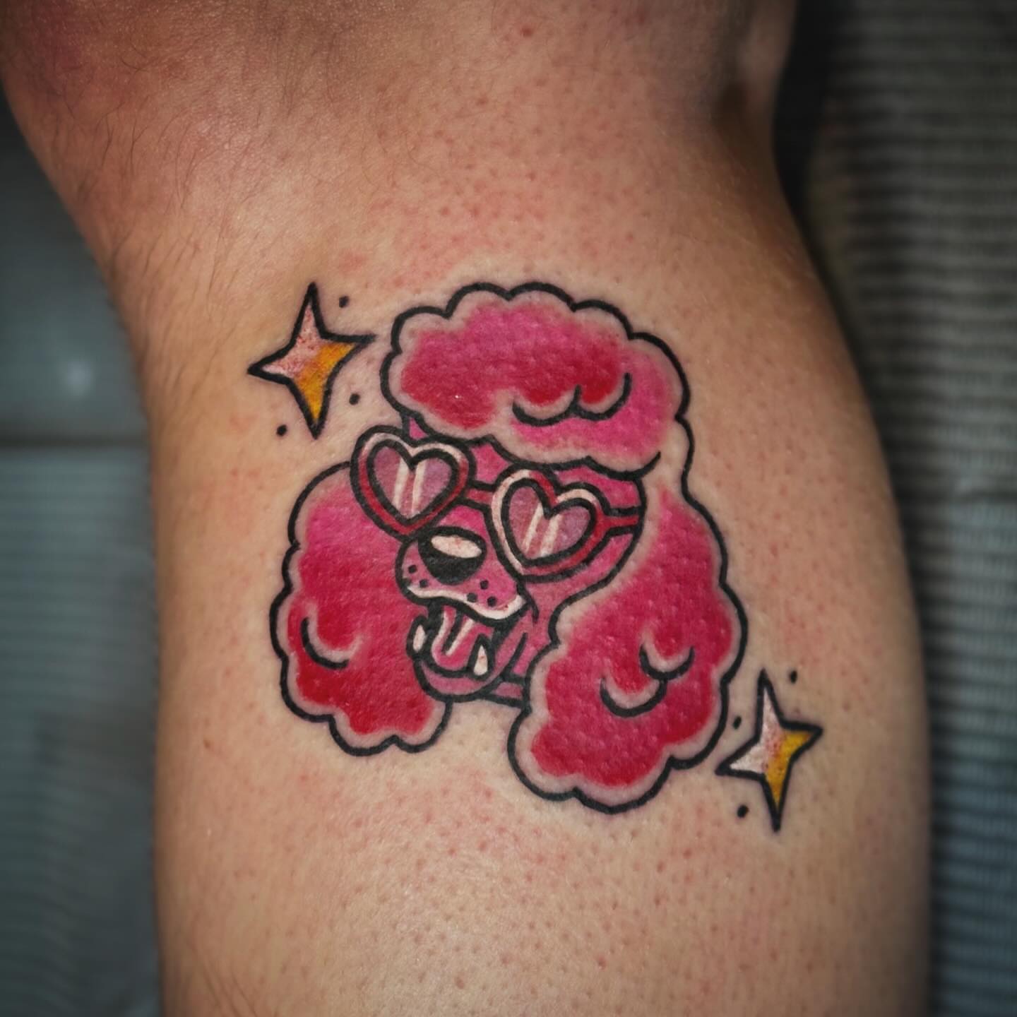 Poodle American traditional tattoo on the thigh by Mim