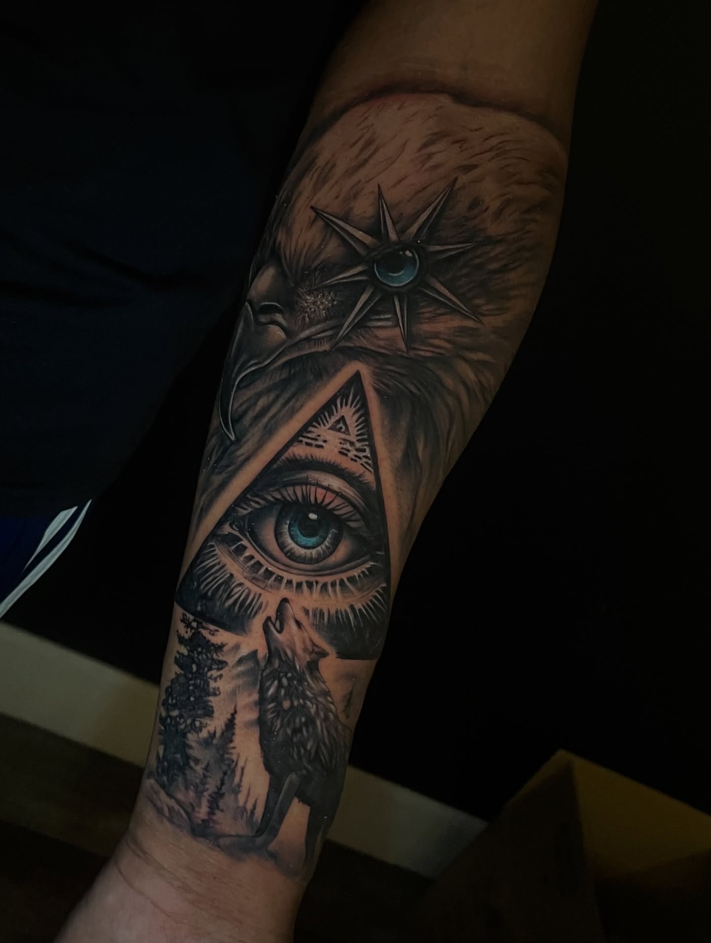 Eye and wolf realism tattoo on the forearm by ✨tiffy ✨