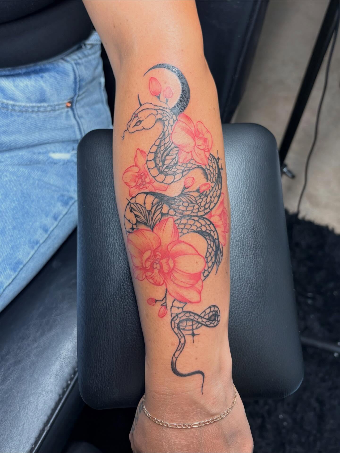 Snake and flowers new school tattoo on the forearm by Bay Area Tattoo Artist ✍🏽