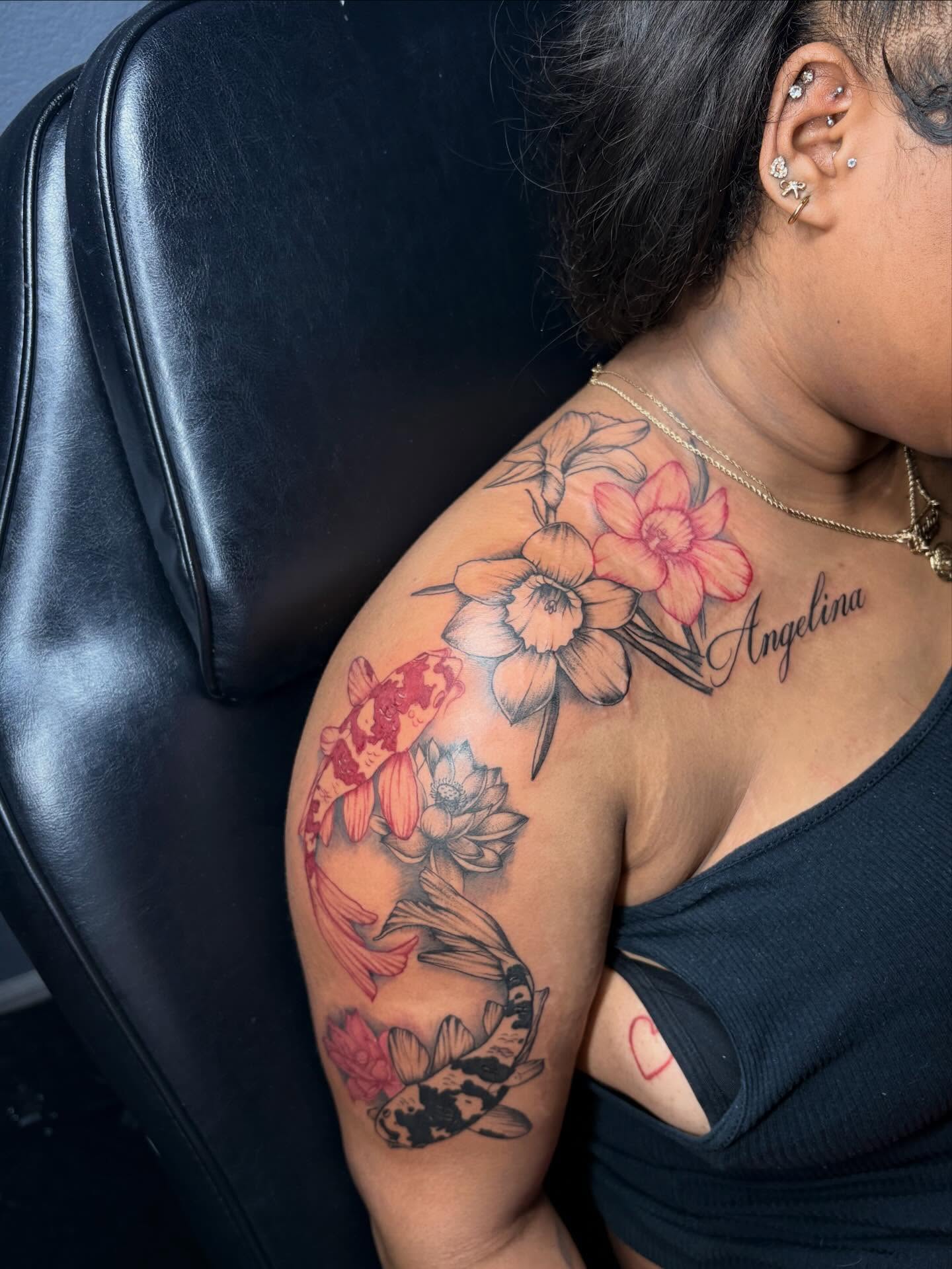 Koi fish and flowers japanese irezumi tattoo on the shoulder by Bay Area Tattoo Artist ✍🏽
