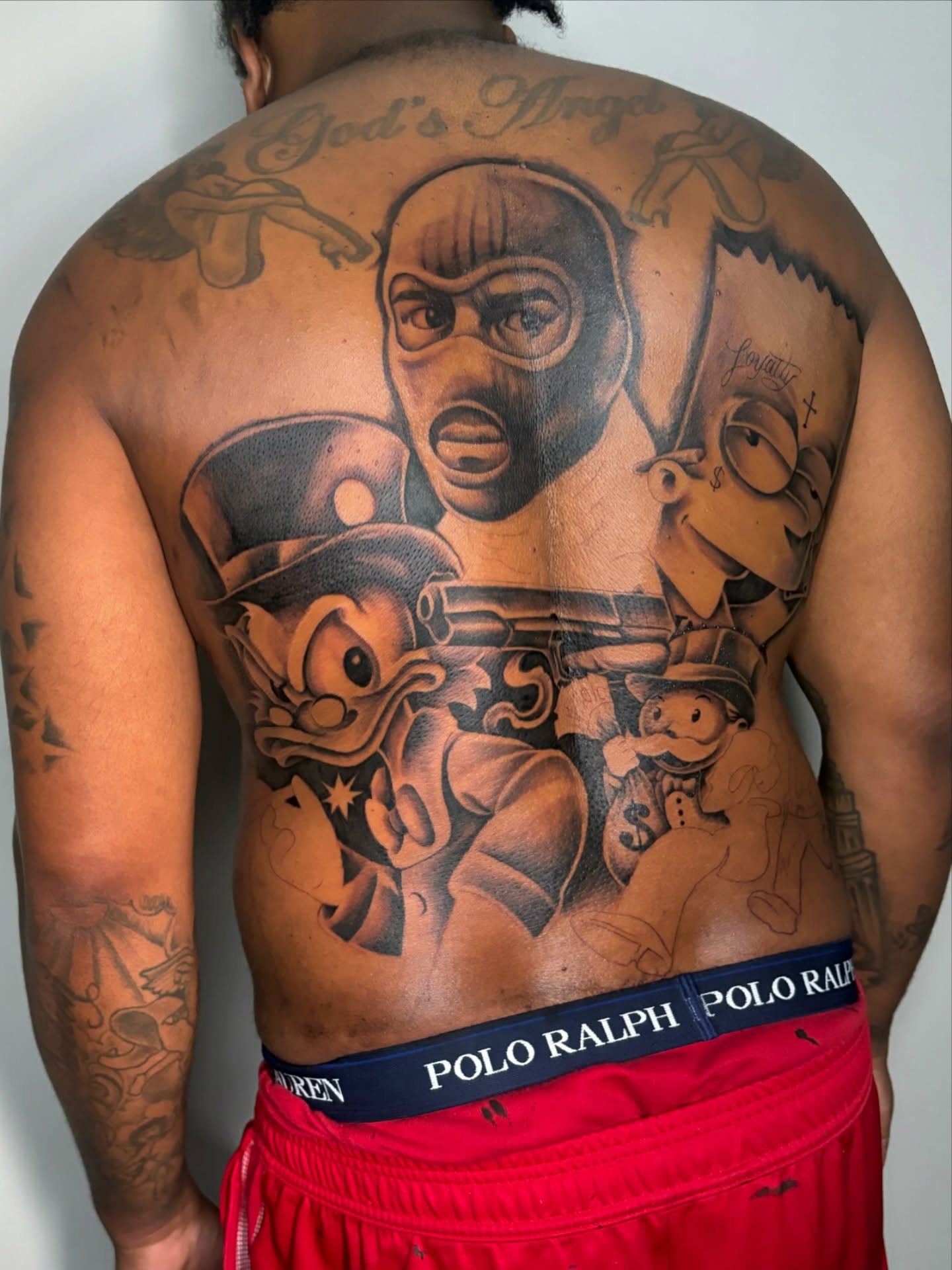 Gangster characters American traditional tattoo on the back by FleeDott 🇨🇴