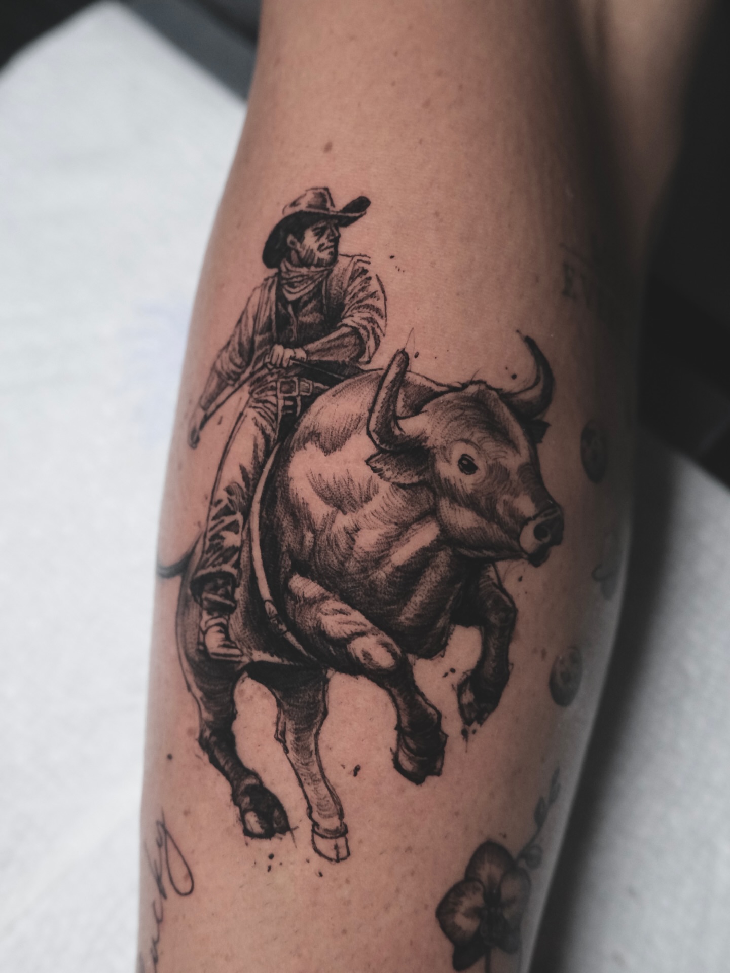 Bull riding realism tattoo on the forearm by HanaKaki