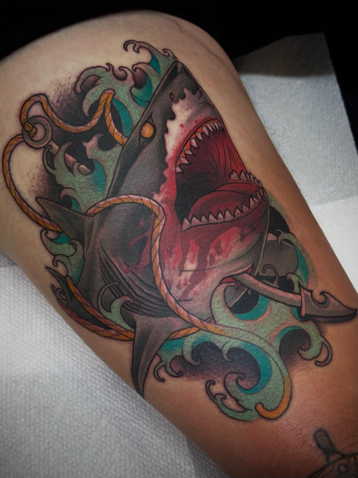 Shark American traditional tattoo on the thigh by Espinal
