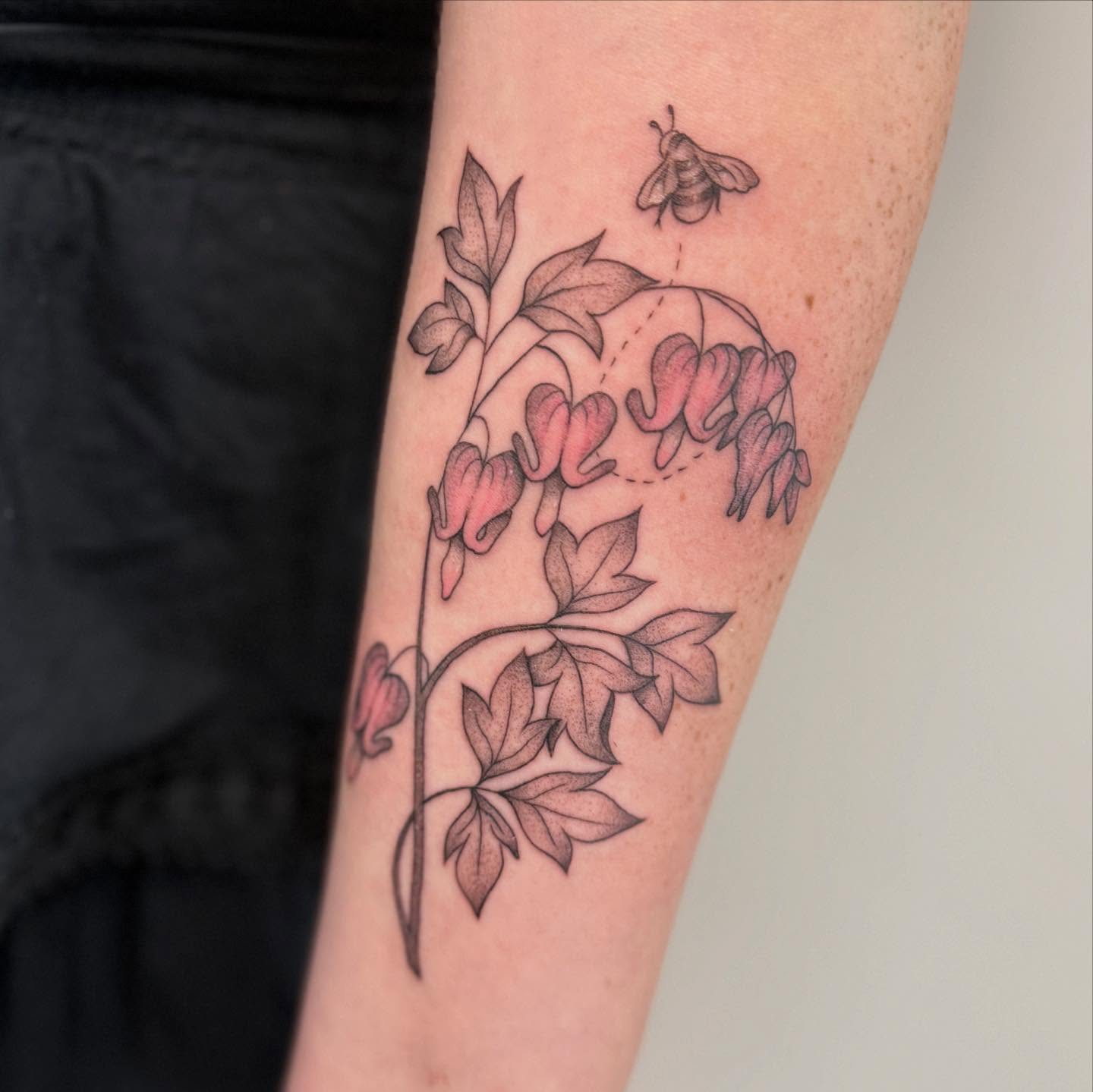 Dopamine flower black and grey tattoo on the forearm by Felicity
