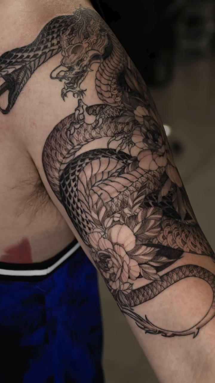 Dragon and snake japanese irezumi tattoo by Gary Zhong, Upland, California