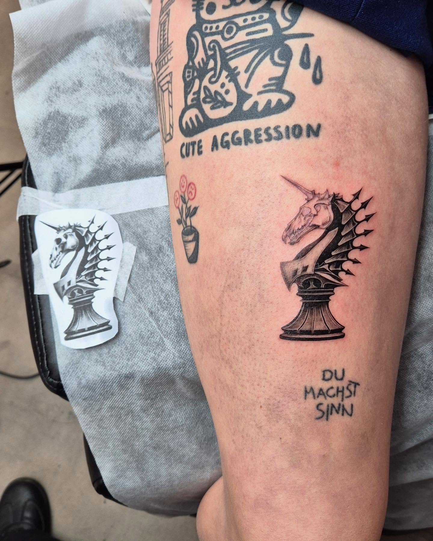 Chess knight black and grey tattoo on the thigh by 𝑴𝒆𝒍𝒐