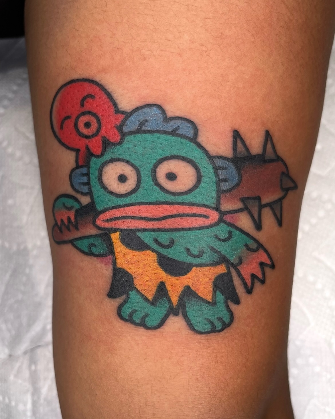 Monster new school tattoo on the forearm by Robyn Fricke