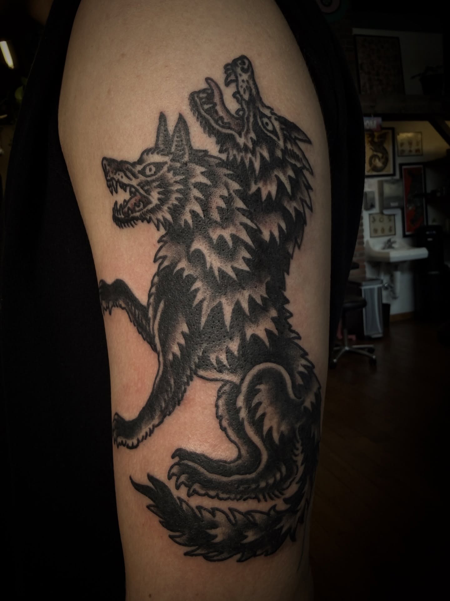 Wolf black and grey tattoo on the forearm by Jesse Swanson, Santa Rosa, California