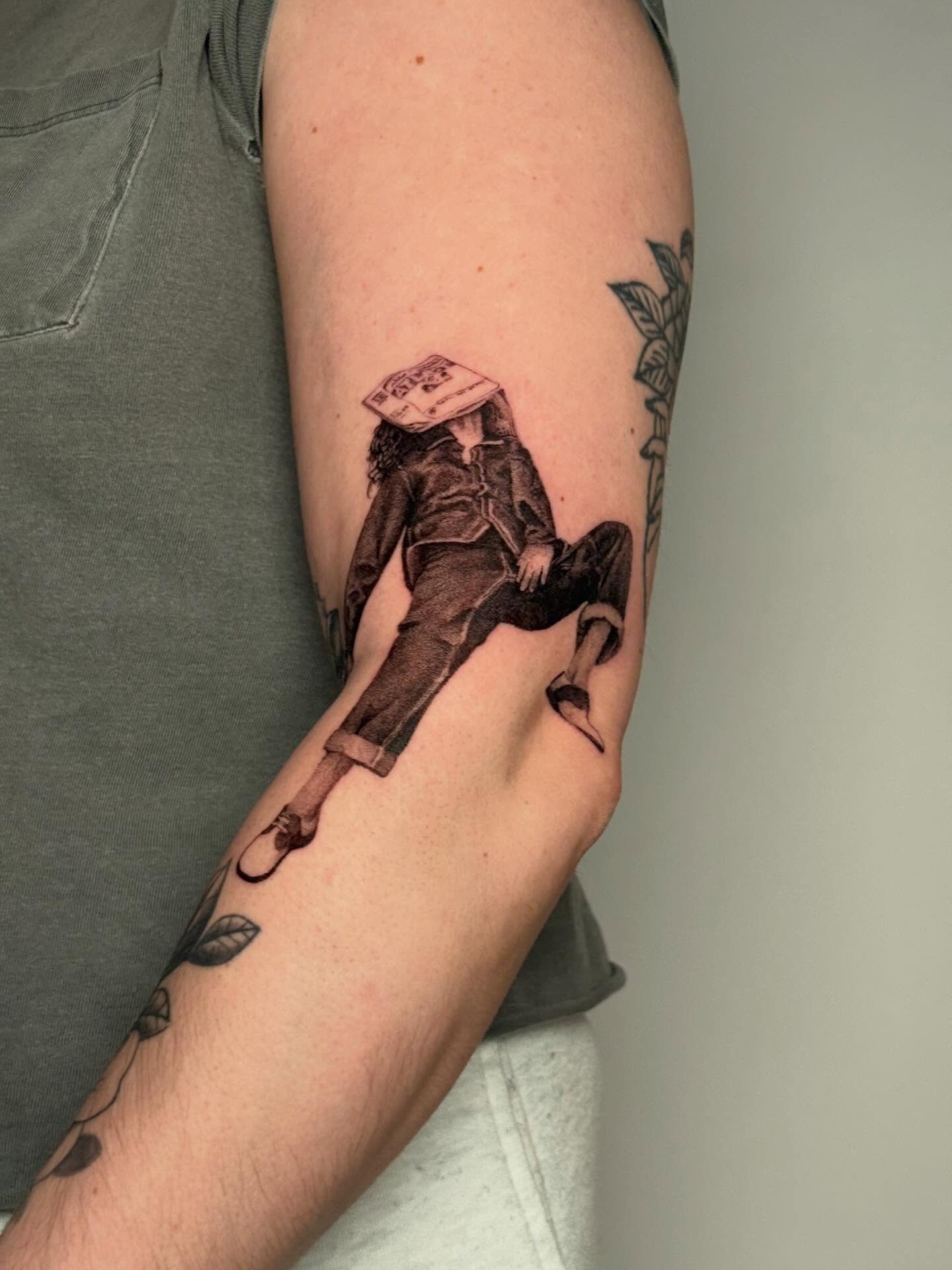 Woman with hat realism tattoo on the forearm by Andrew Flatts