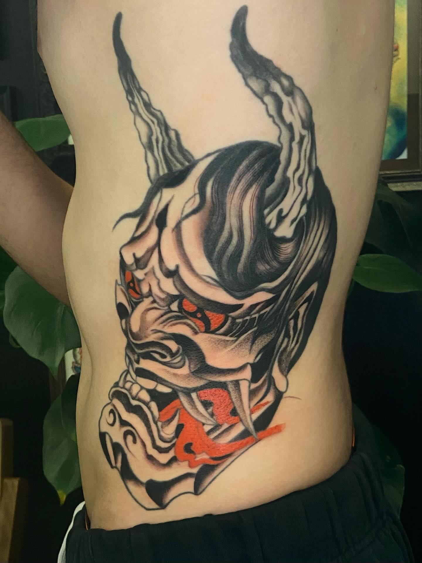 Demon mask japanese irezumi tattoo on the ribs by Las Vegas Tattoo Artist π€ Nani