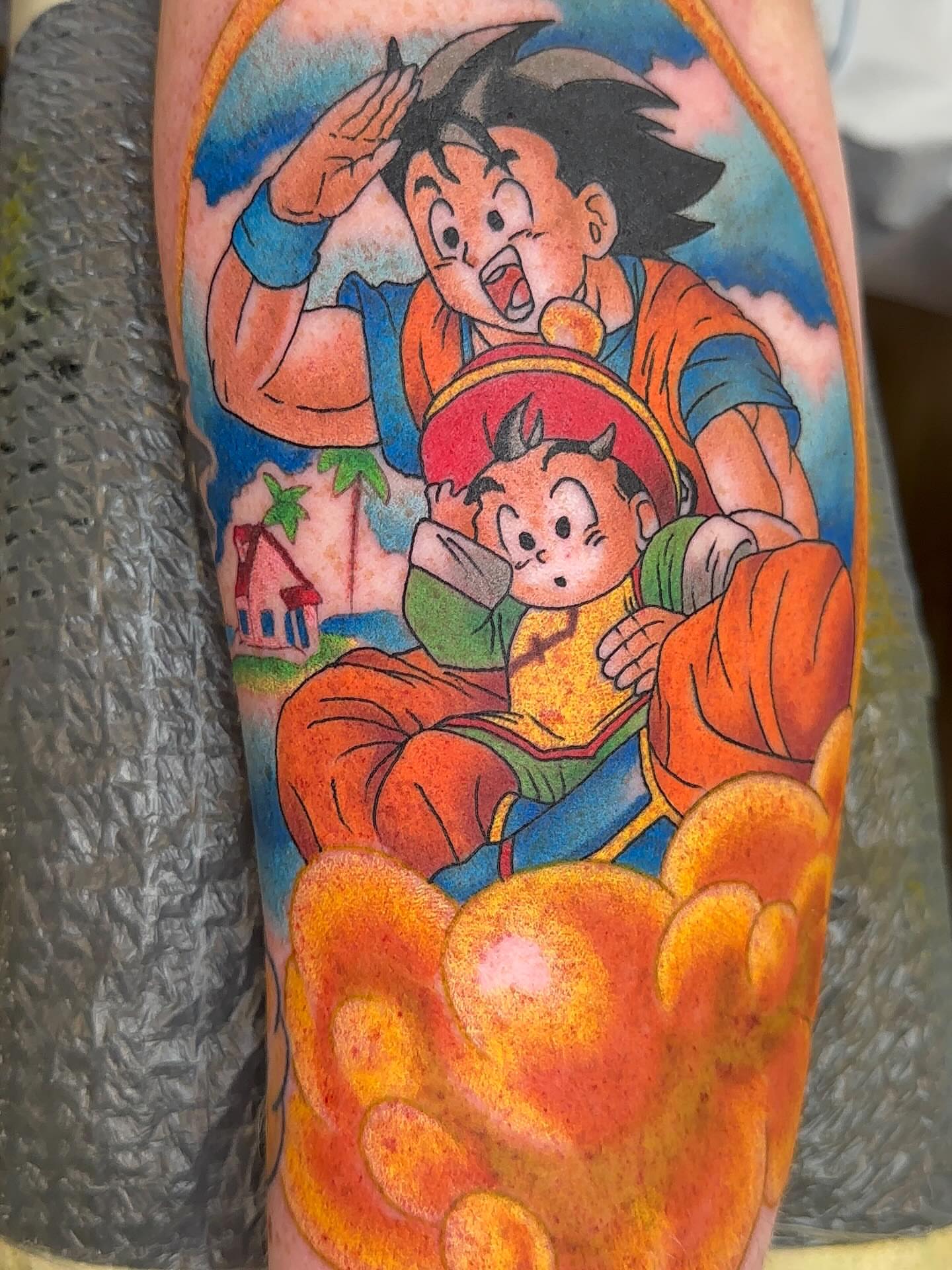 Son goku and son gokou anime tattoo on the forearm by Cody Hanson