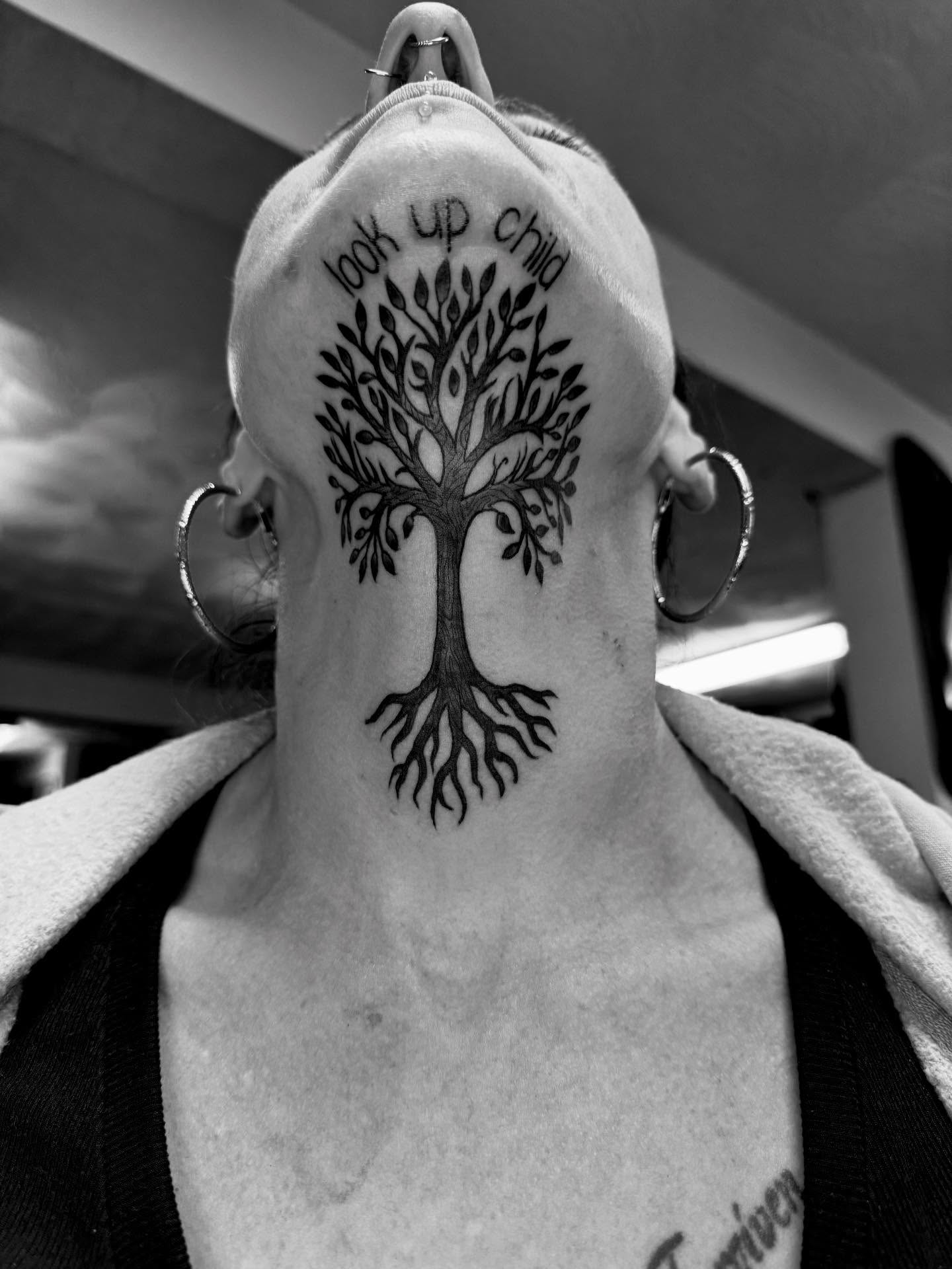 Tree black and grey tattoo on the neck by Justin Fiveson