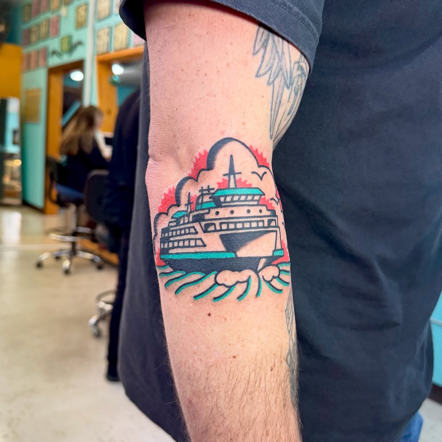 Cruise ship American traditional tattoo on the forearm by Sam